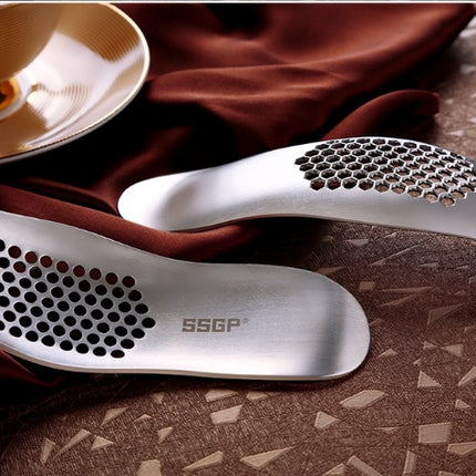 Stainless steel garlic press