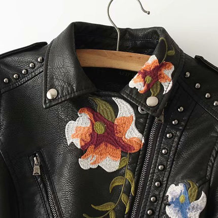 Embroidered studded leather jacket