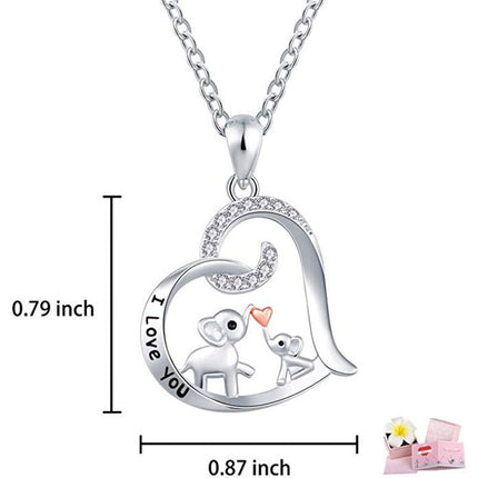 Baby elephant kisses the necklace