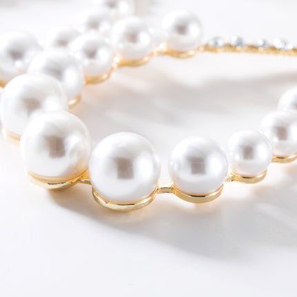 Diamond imitation pearl earrings
