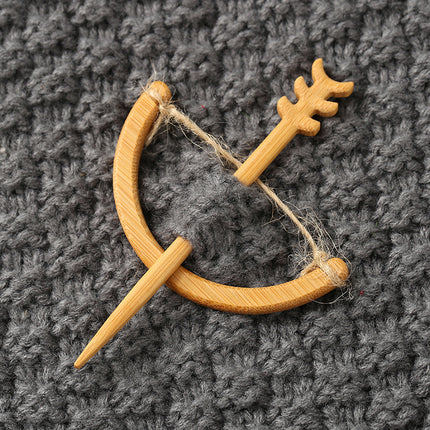 Houtdier-uitkerf-borsspeldgeskenk