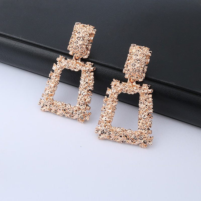 Exaggerated geometric metal earrings