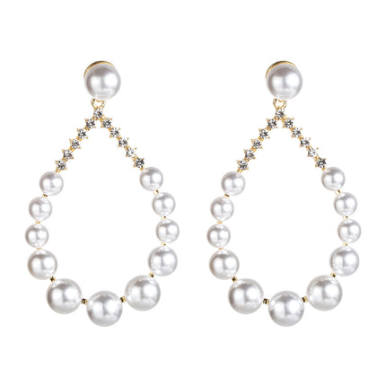 Diamond imitation pearl earrings
