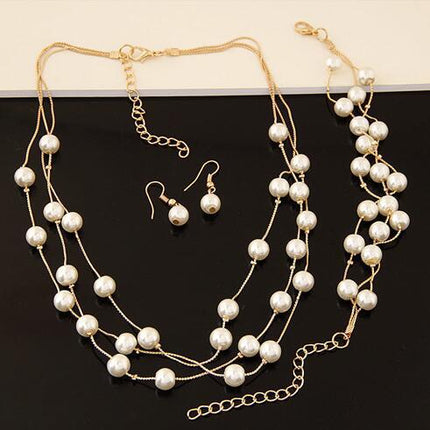 Alles-pas Soet En Elegante Bruid Bruidsmeisie Netwerk Pêrel Halssnoer Armband Oorringstel 3 Stuk Juweliersware Groothandel