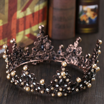 Ouvintage Pêrelkopstuk in Diamantbesaaide Metaal