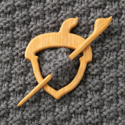Houtdier-uitkerf-borsspeldgeskenk