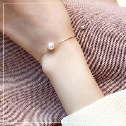 Enkele 18K Goud Japannese Akoya seepêrelarmband verstel natuurlike rooswitkleur goud foutlose bol
