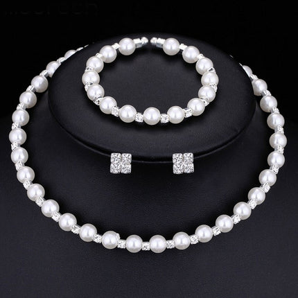 Bruidsbruidsbykomstighede 8MM handgemaakte pêrels, strass-halssnoere, halssnoere, armbande, oorbelle, drie stelle pakke