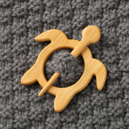 Houtdier-uitkerf-borsspeldgeskenk