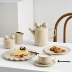 Beige / Coffee cup and saucer