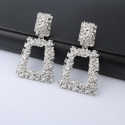Exaggerated geometric metal earrings