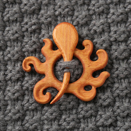 Houtdier-uitkerf-borsspeldgeskenk
