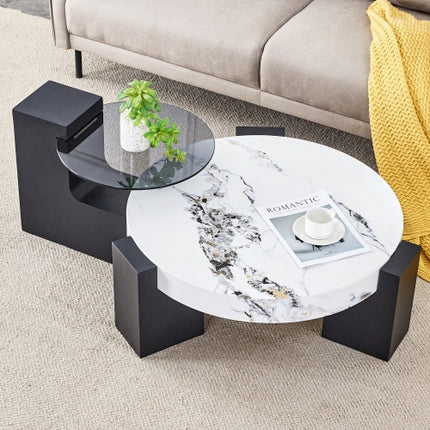 Moderne Eenvoudige Dubbellaag Ronde Koffietafel – Deursigtige Grys Glasblad Met Swart MDF L-vormige Pote. Die Afneembare Ontwerp Kan Die Gebruik Van Ruimte Buigsamer Maak