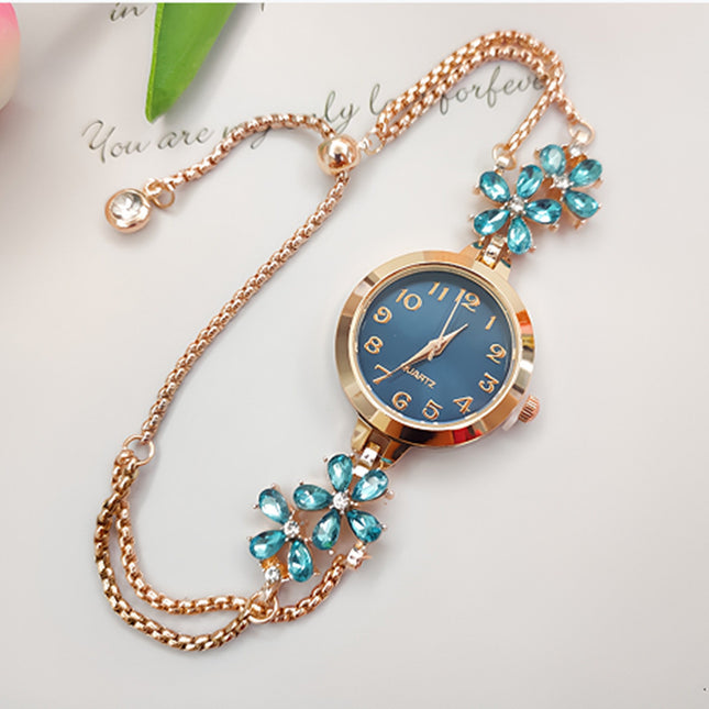 Nuwe Hoë-gehalte Modieuse Blomvormige Diamantbesaaide Armbandhorlosie Vir Vroue