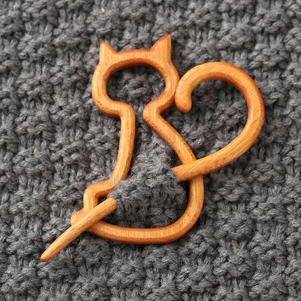 Houtdier-uitkerf-borsspeldgeskenk