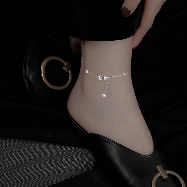 Skoenlapper-enkelband, met 'n uitsoek-skoenlapperontwerp wat rats en elegant is. Die dun ketting pas die enkel knus en gloei met 'n effense glinstering, wat romantiese vindingrykheid by someruitrustings voeg.
