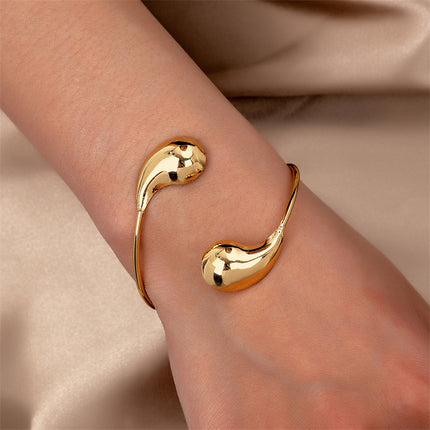Skeppende Alles-pas Waterdruppelarmband Vir Vroue