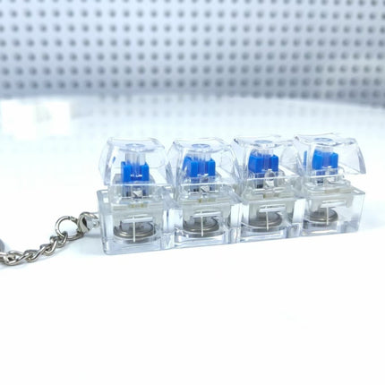 4 Sleutels Meganiese Sleutelbord Elektroniese Liggende Deursigtige Kristal Hoogte Drukvermindering Vingerknoppie Anti-Stres Sleutelknop Speelding Skooltassleutelhanger Dekompressie Klikker Gadget Geskenk