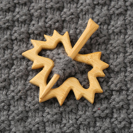 Houtdier-uitkerf-borsspeldgeskenk