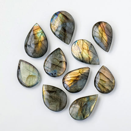 Natural Crystal Blue Light Elongates Stone Droplets