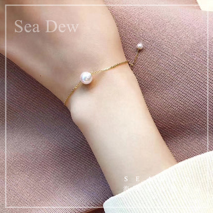 Enkele 18K Goud Japannese Akoya seepêrelarmband verstel natuurlike rooswitkleur goud foutlose bol