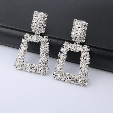Exaggerated geometric metal earrings