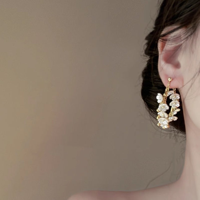 Dramatiese Strand-styl Blomkwassie-oorbelle