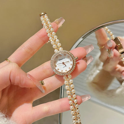 Damesarmband oesjaar varswater pêrelhorlosie