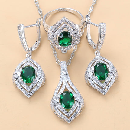 Oorringe met juweelinlegsel, hangertjie, halssnoer, ring Drie-stuk stel vir dames