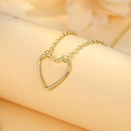 Fashionable Minimalist Hollowed-out Heart Necklace For Women With A Niche Design