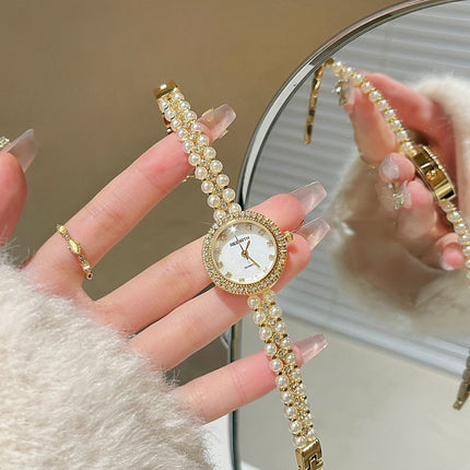 Damesarmband oesjaar varswater pêrelhorlosie