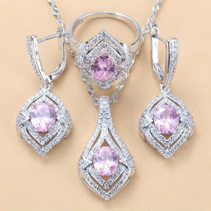 Oorringe met juweelinlegsel, hangertjie, halssnoer, ring Drie-stuk stel vir dames