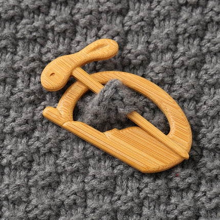 Houtdier-uitkerf-borsspeldgeskenk