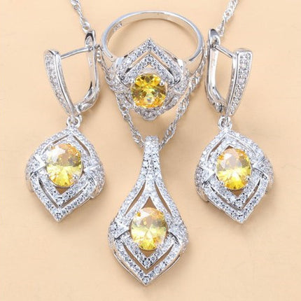 Oorringe met juweelinlegsel, hangertjie, halssnoer, ring Drie-stuk stel vir dames