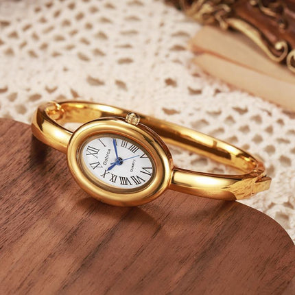 Lig-luukse Nis Ovale Dameshorlosie Met 'n Roosgoud Diamantrand